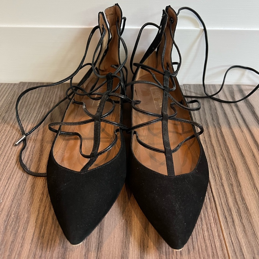 Aquazzura black suede lace up flats. Originally from BARNEYS Chicago.